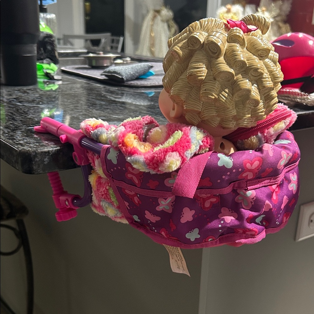 Butterfly Patterned Doll Carrier with Pink and Purple Accents